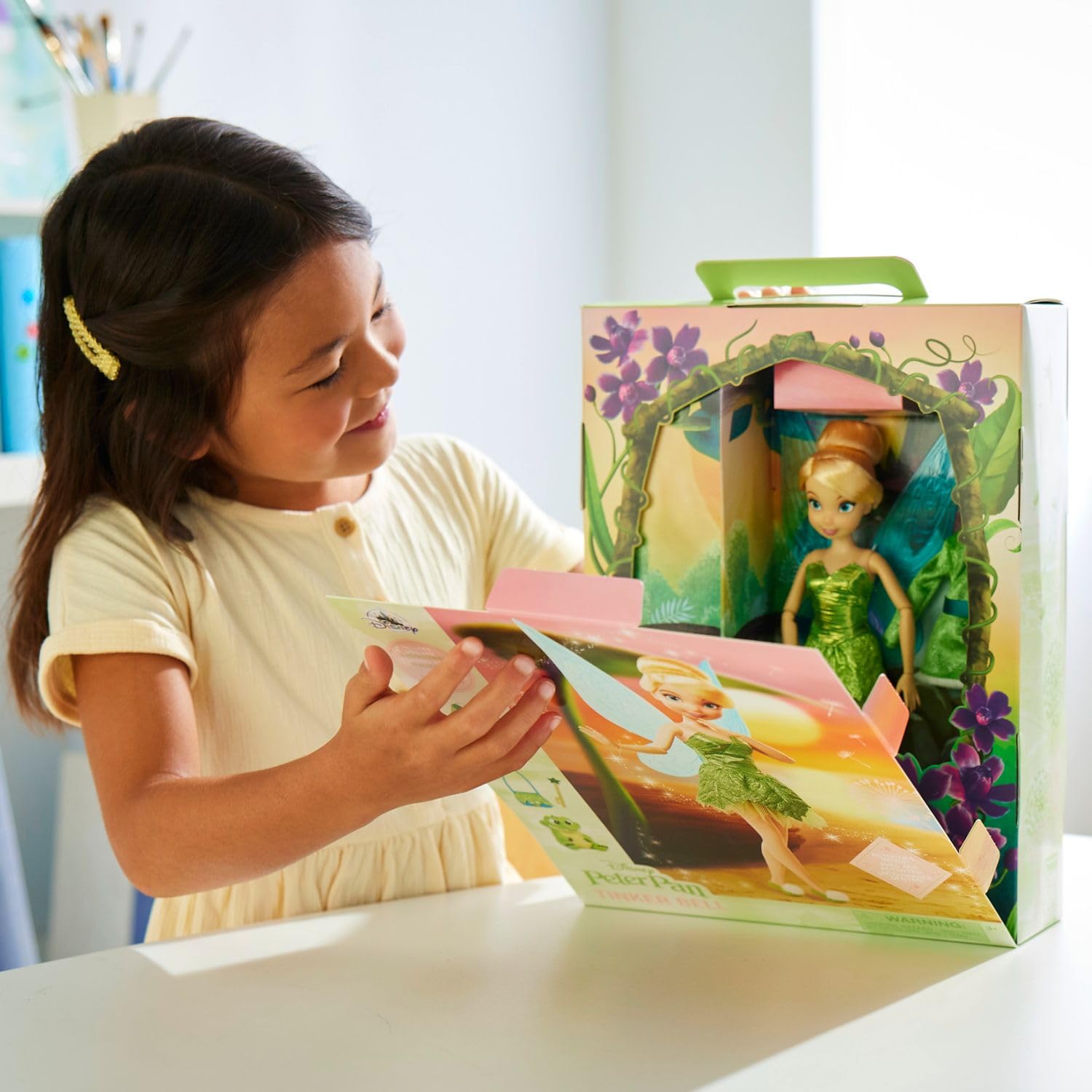 Disney Store Tinker Bell Story Doll boots with furry pom-poms complete the look.