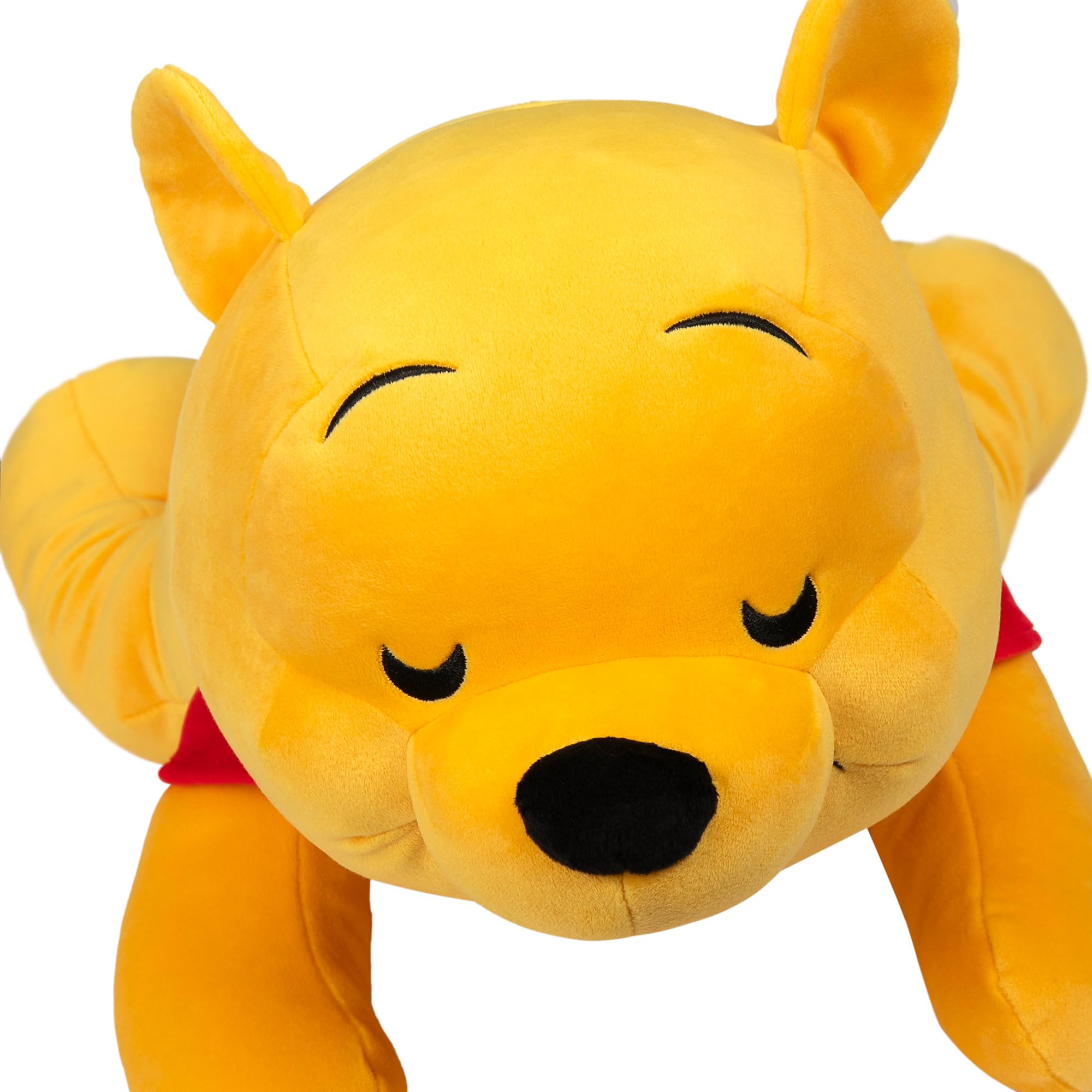 Cuddly Pooh plush with velour shirt invites hugs and imaginative playtime.