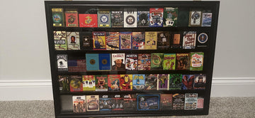 DisplayGifts display case with lip-edged shelves prevents decks from sliding.