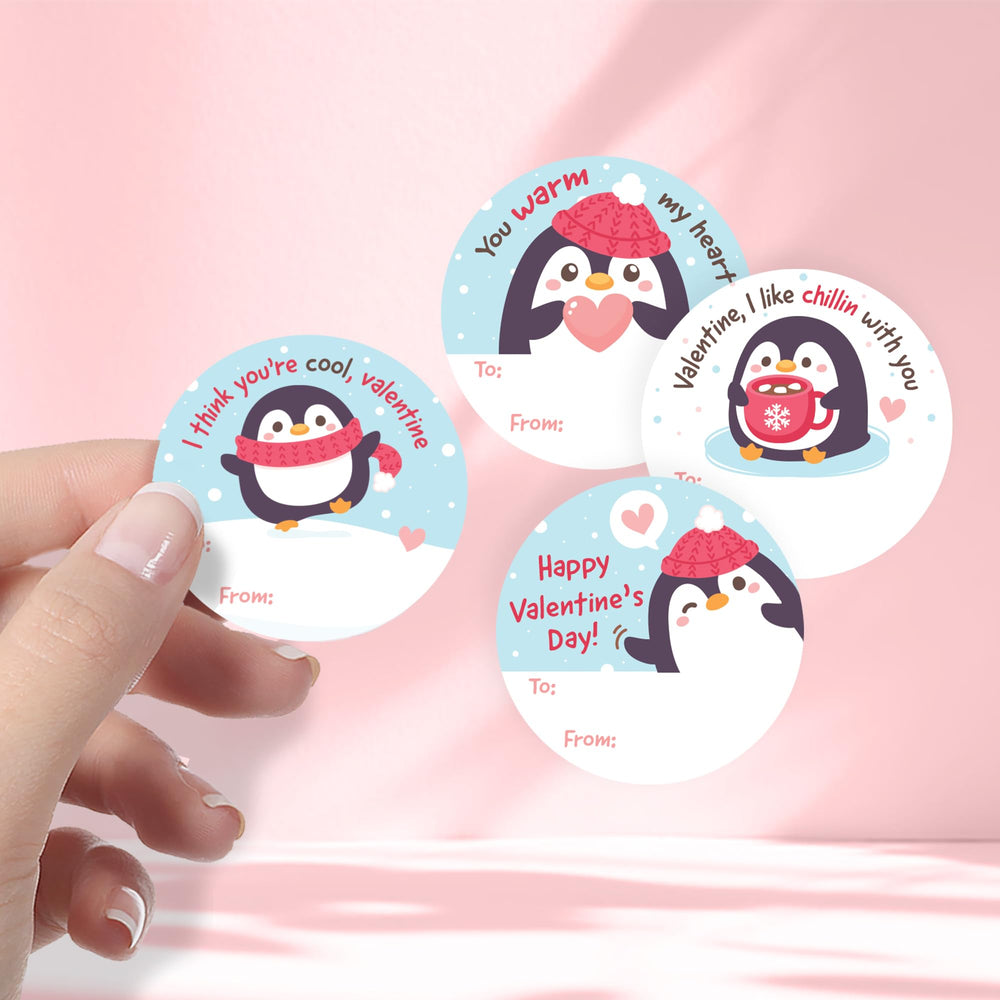 Distinctivs Penguin Valentine design 2 round labels add charm to juice boxes and snacks.