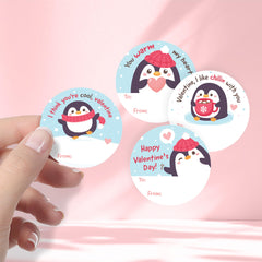 Distinctivs Penguin Valentine design 2 round labels add charm to juice boxes and snacks.