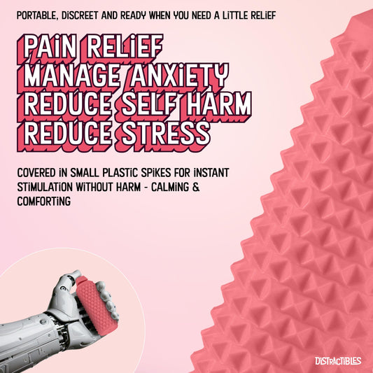 Distractibles Sensory Roller Fidget with spikes around cylinder provides tactile stimulation.
