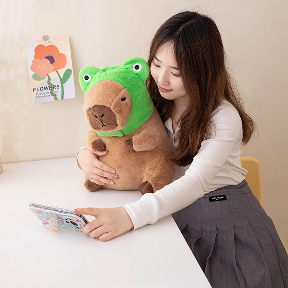 Ditucu capybara plush with detachable frog hat for versatile styling and play.