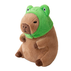 Ditucu capybara plush with frog hat for playful charm and cozy hugs.