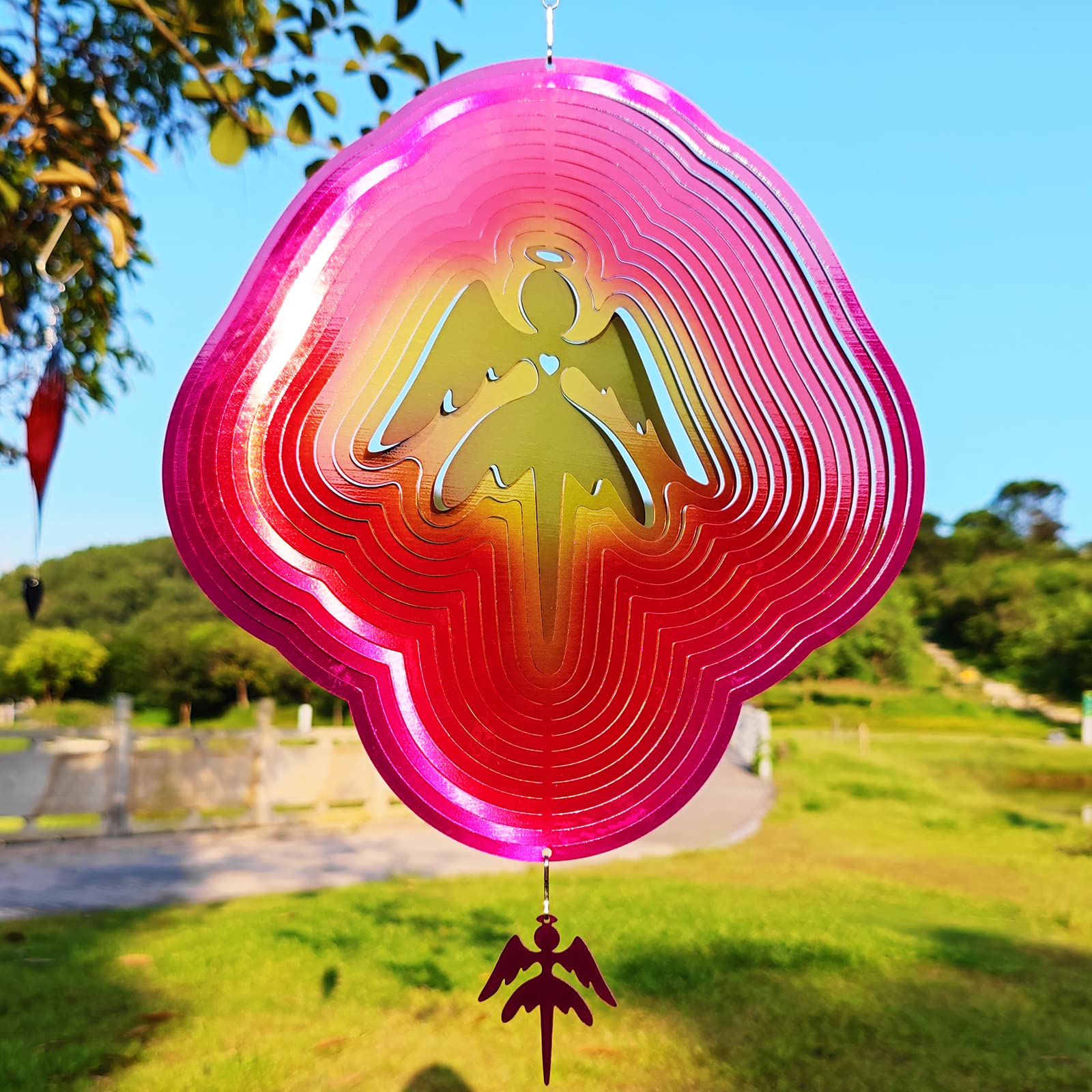 DJUAN outdoor metal wind spinner with reflective surfaces catches light beautifully.
