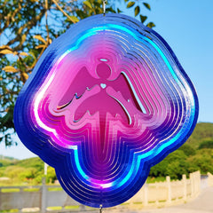 DJUAN Angel Wind Spinner yard decor in bright colors enhances outdoor spaces.