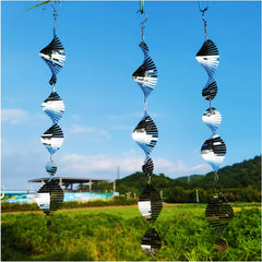 DJUAN sparkle wind spinners set rotates in breeze, adding decorative deterrence.