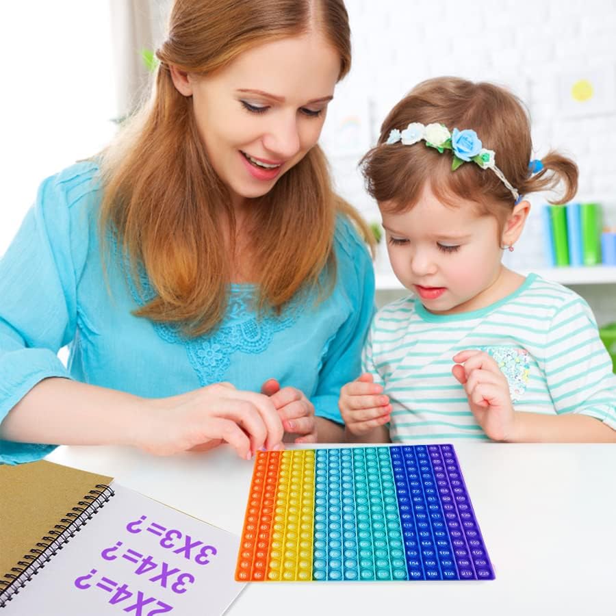 DK-SIMINA quiet tactile pops provide sensory engagement without noise.