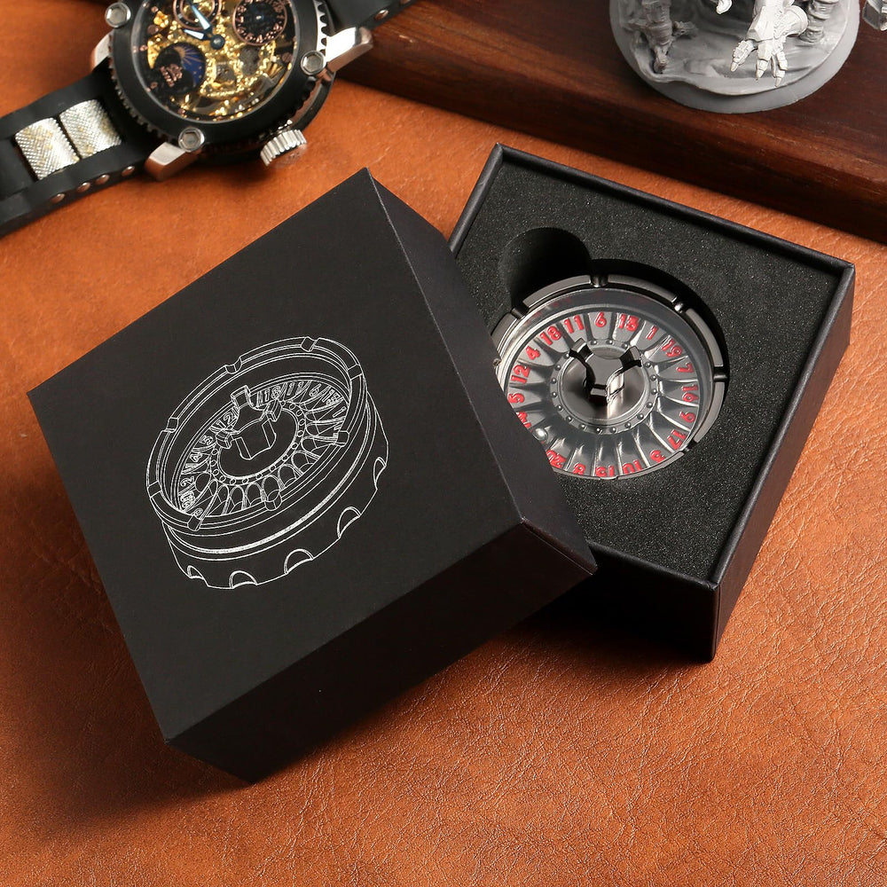DNDND display-ready dice collection with bold metal finish and dragon motif.