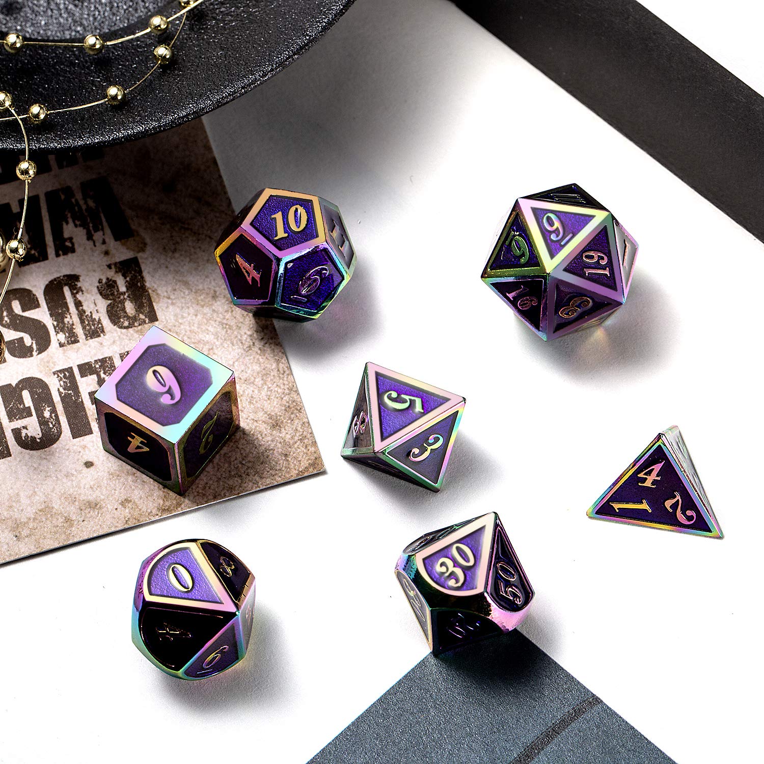 DNDND purple rainbow-detailed dice resting on a gaming mat during sessions.