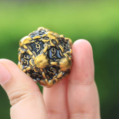 DNDWoW 31mm oversized skull D20 front view emphasizes weight and presence.