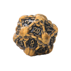 DNDWoW heavy metal gold skull D20 close-up showing oversized dice.
