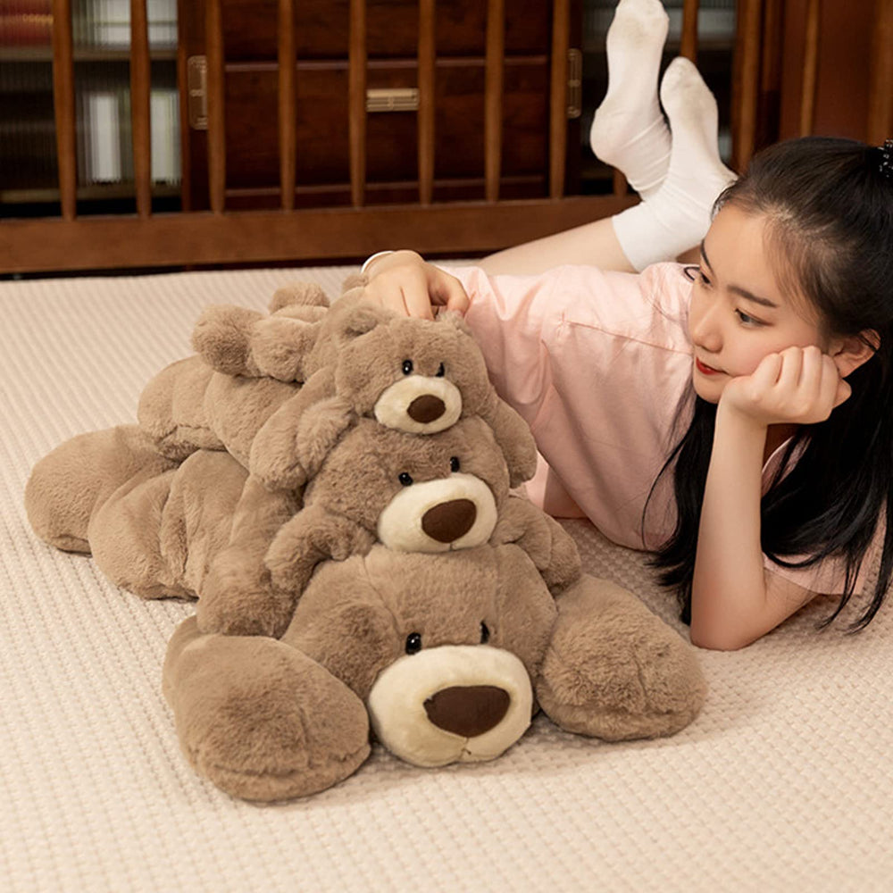 Doireum weighted bear in living room as cozy decor and supporting pillow.