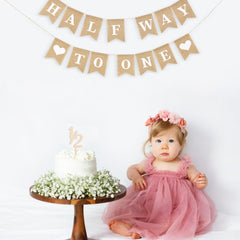 Dokuna banner boho theme setup enhances a chic party backdrop for photos.