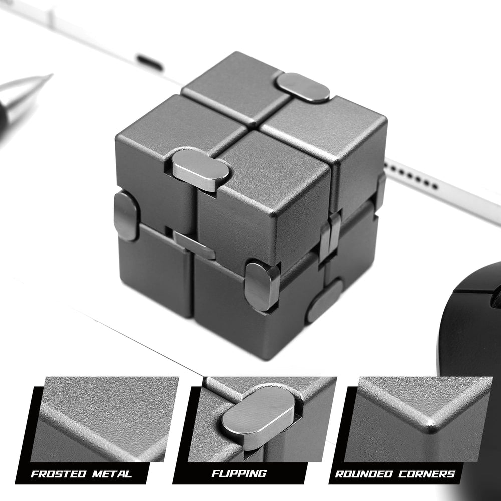 DOLASEV Infinity Cube on a desk setup to aid focus