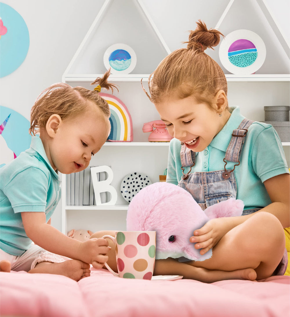 DolliBu Pink Whale plush in kids' arms makes a safe, cuddly companion.