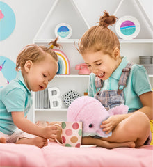 DolliBu Pink Whale plush in kids' arms makes a safe, cuddly companion.
