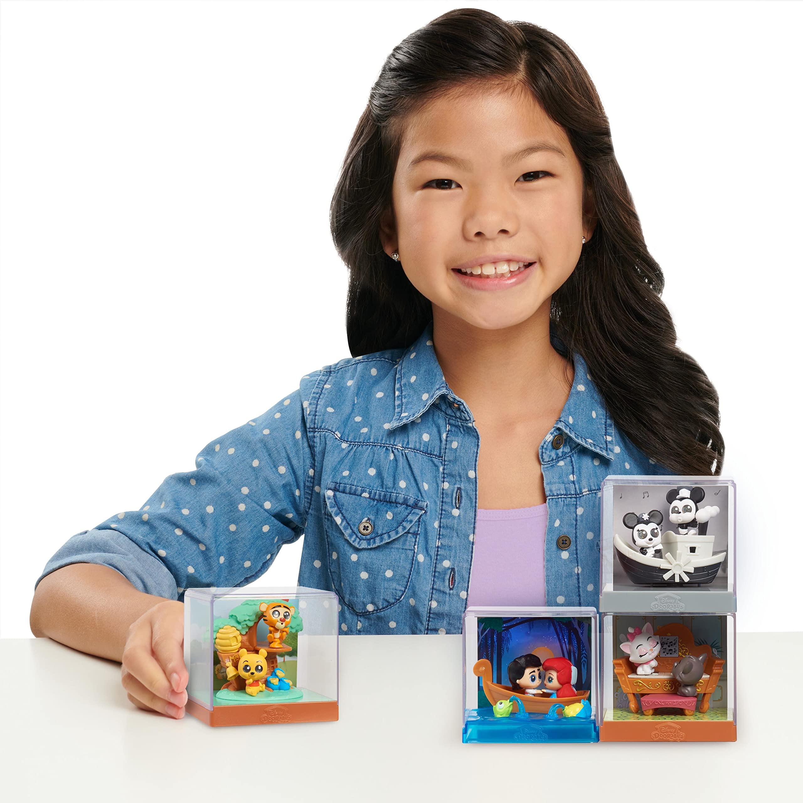 Doorables Movie Moments diorama display featuring two collectible figures and backdrop.