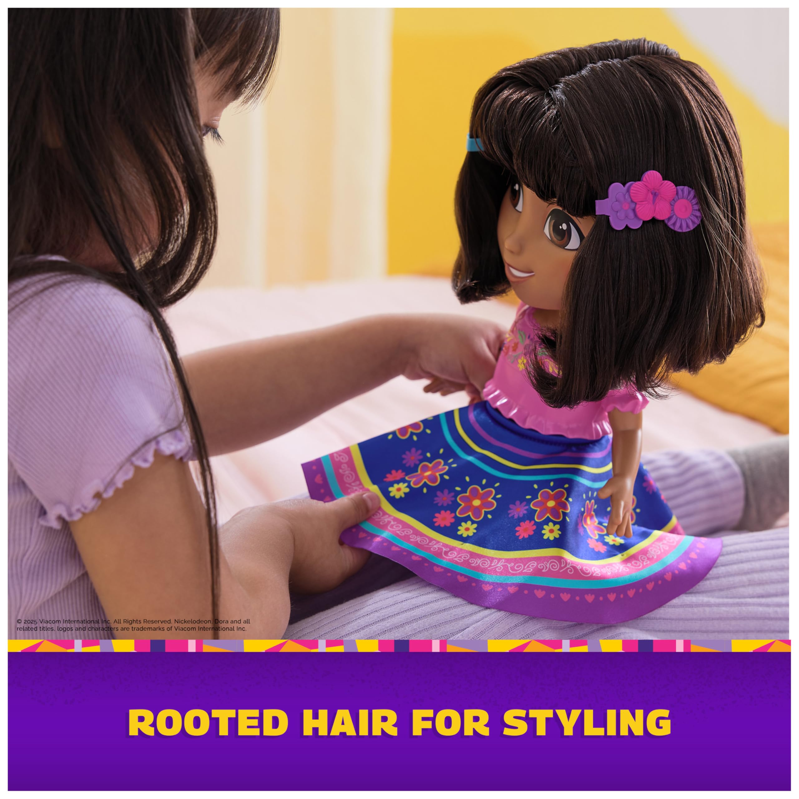 Pressing Dora’s flower on her shoes activates dance and phrases.