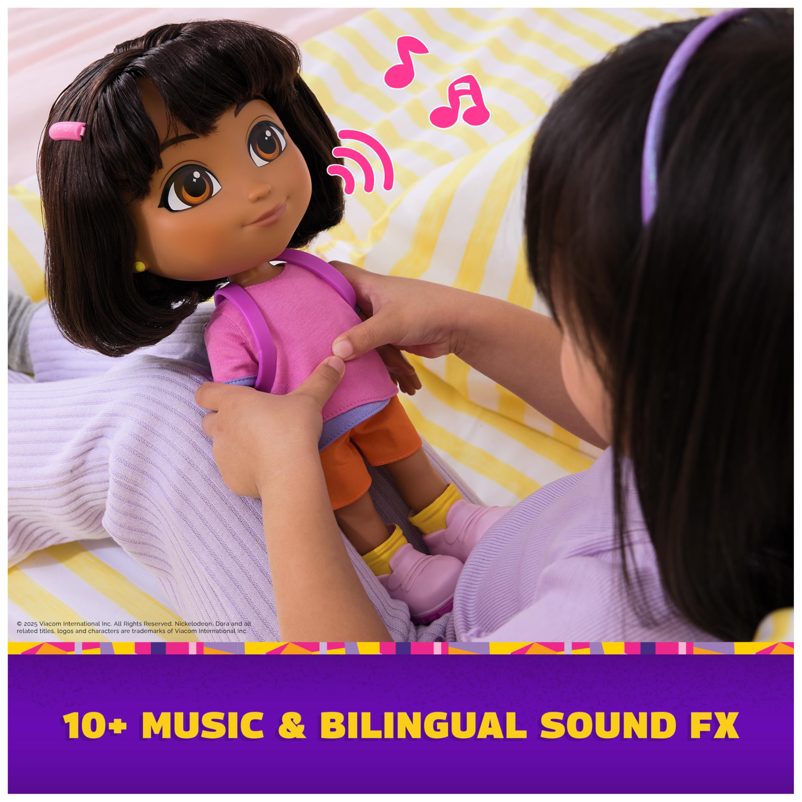 Dora Sing & Explore doll with removable shoes and accessories for dress-up fun