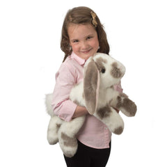 Douglas Ramsey gray spotted bunny with a realistic pose and amber eyes