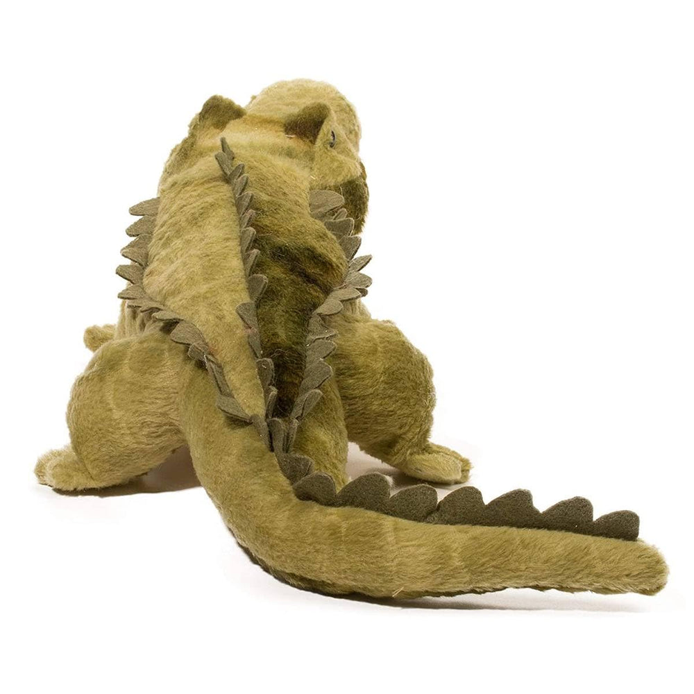 Douglas Stream Line plush features snaggletooth teeth for adventurous storytelling.