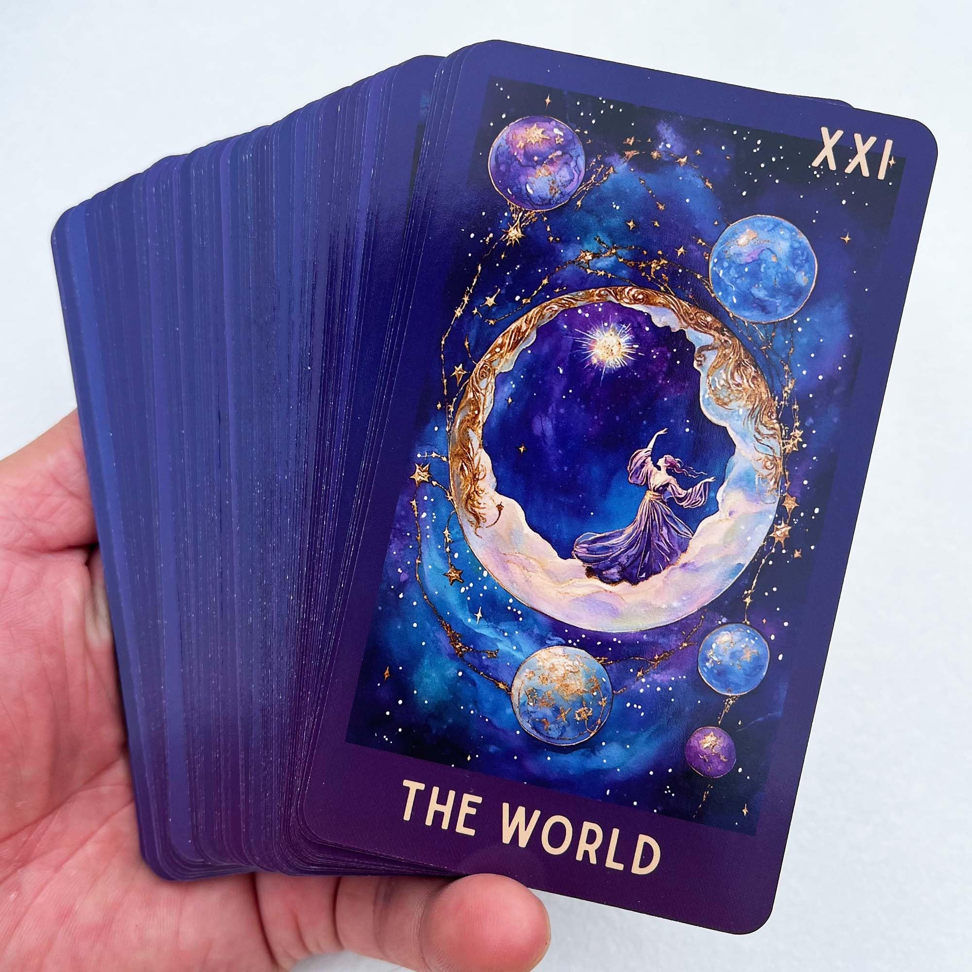 DPEHAKMK Celestial Tarot card closeup reveals starry details and color depth