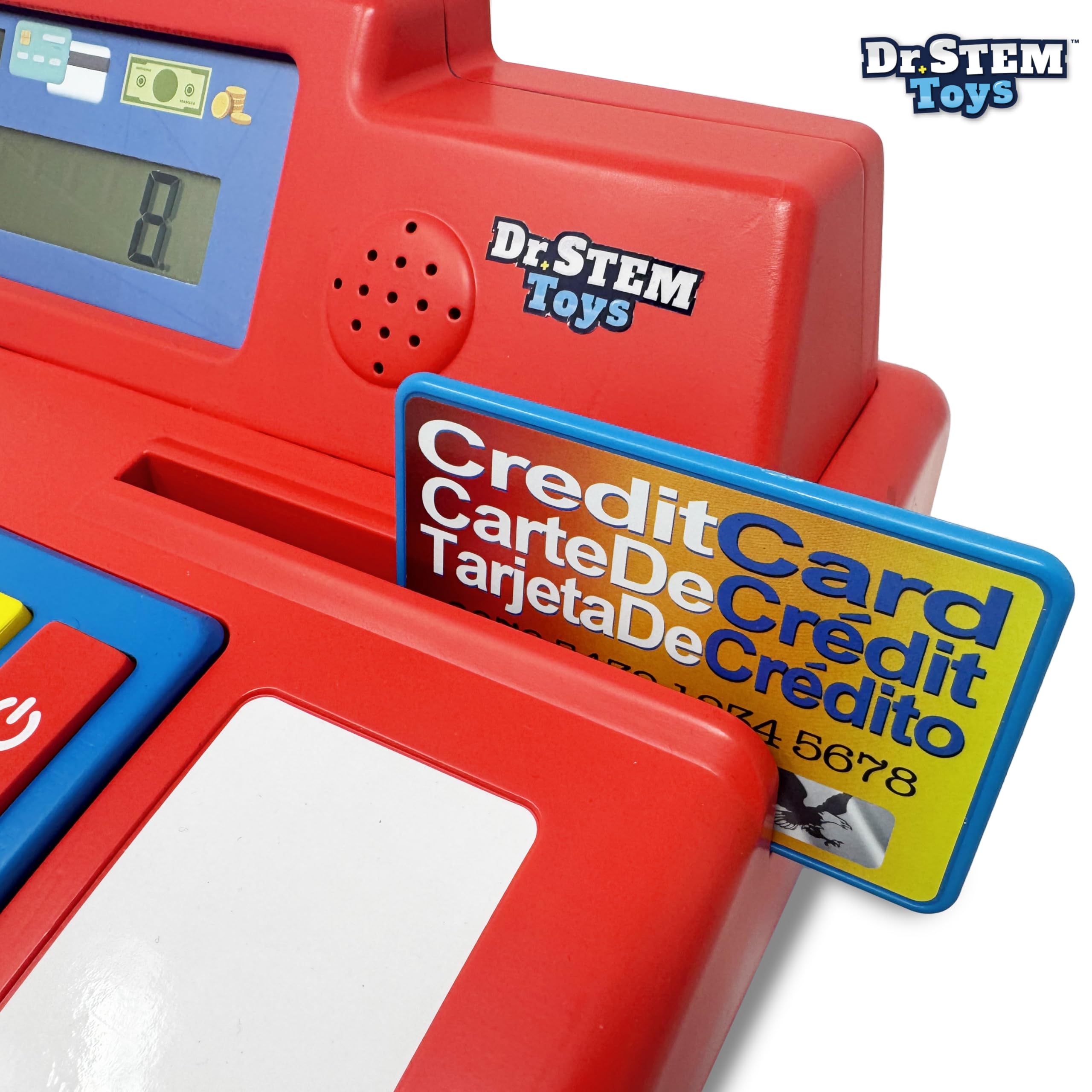 Child playing with the pretend cash register during learning.