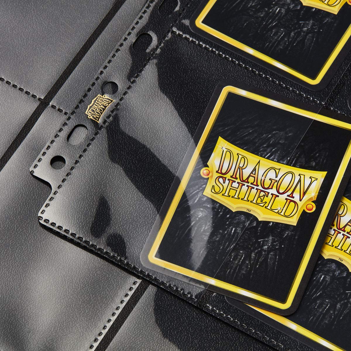 Dragon Shield Arcane Tinmen portfolio pocket detail with ultra-clear pockets on black backing