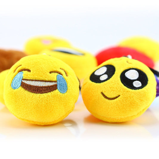 Dreampark emoticon keychain top-view with clip for easy bag attachment.