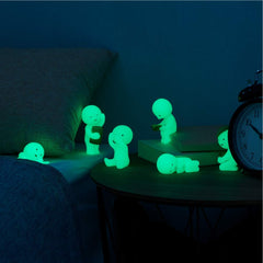 Dreams Smiski glow-in-the-dark bed-relaxing figure creates a cozy nightstand accent