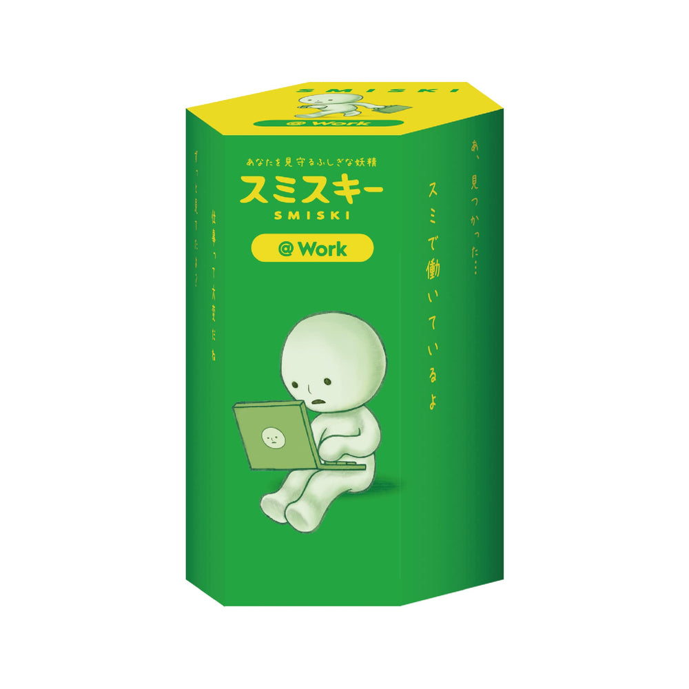 Dreams Smiski mini figure at work glows in the dark for a playful desk companion.