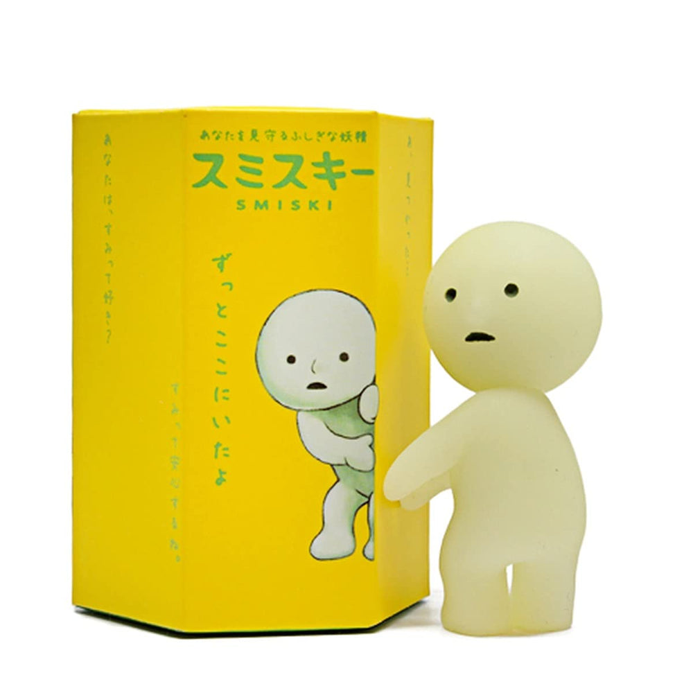 Dreams Smiski Series 1 blind box figure glows softly in dark corners.