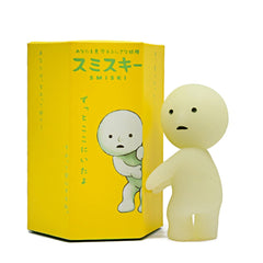 Dreams Smiski Series 1 blind box figure glows softly in dark corners.