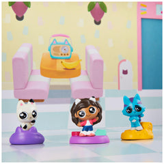 DreamWorks Gabby’s Dollhouse dollhouse mat transforms the box into a play space.