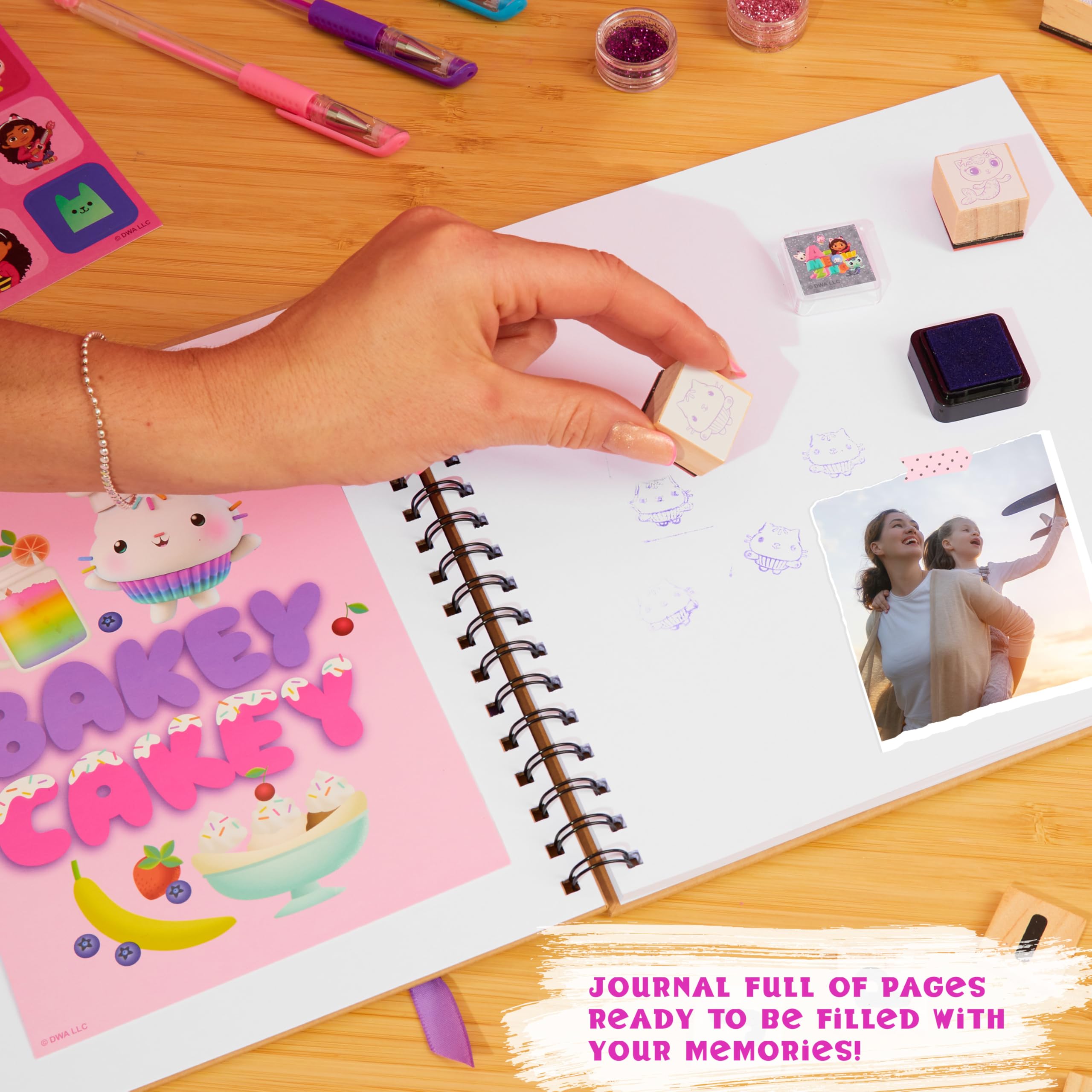 Glitter glue accents from Gabby’s Dollhouse Scrapbook Kit for sparkle details