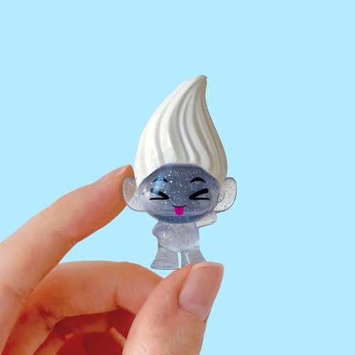 DREAMWORKS TROLLS Mineez blind bag unboxing moment captures surprise.