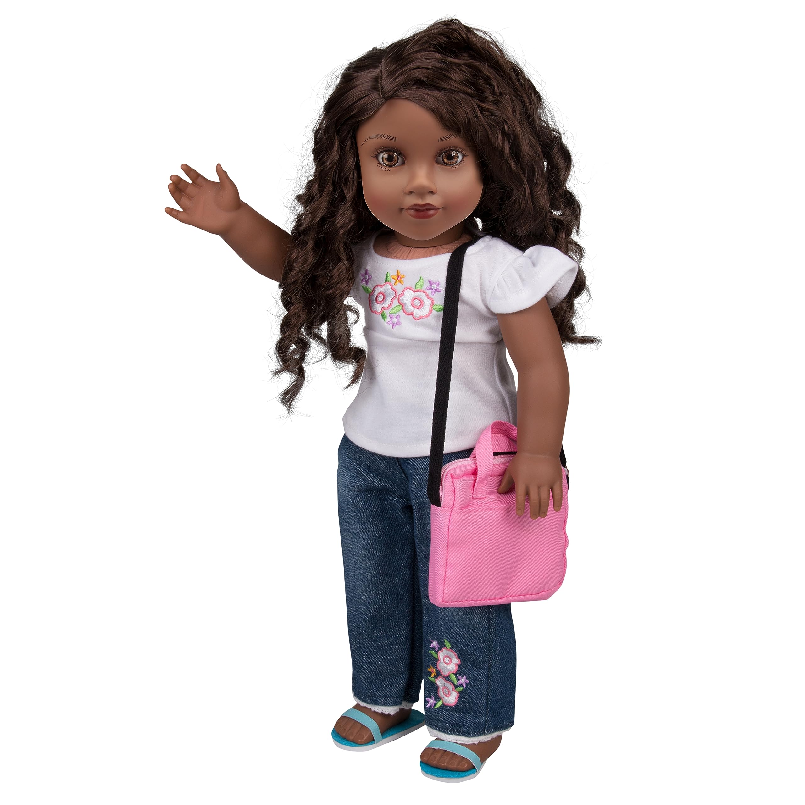 Dress Along Dolly doll using the metal laptop in imaginative play.