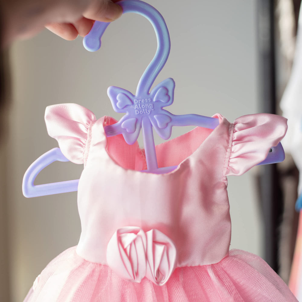 Dress Along Dolly hanger helping keep a doll wardrobe neatly organized