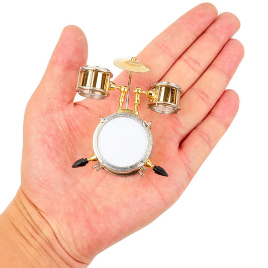 Dselvgvu drum case in gold, ideal for shelving or dollhouse setups