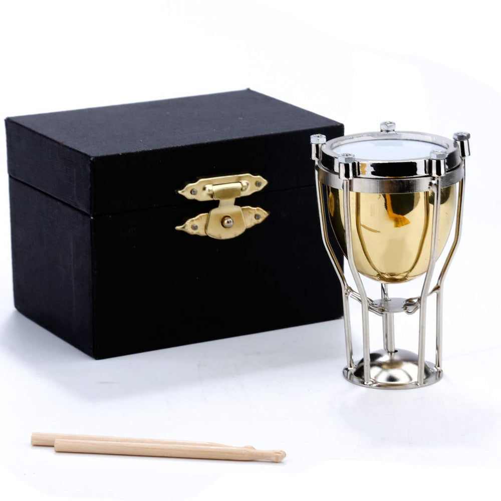 Dselvgvu miniature timpani brass close-up highlights craftsmanship for collectors.