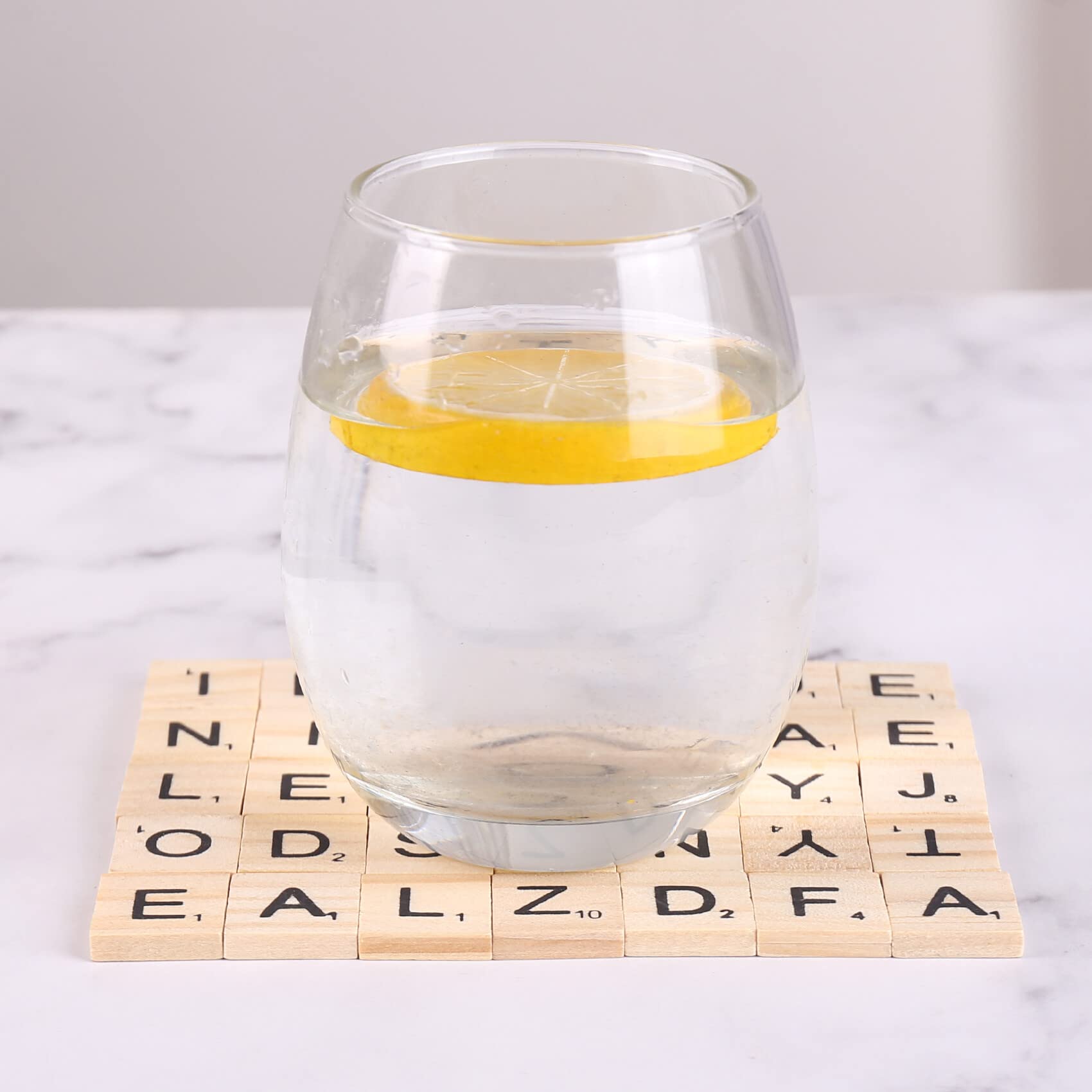 DSYJ Scrabble tiles jewelry making concept demonstrates versatile small tiles.