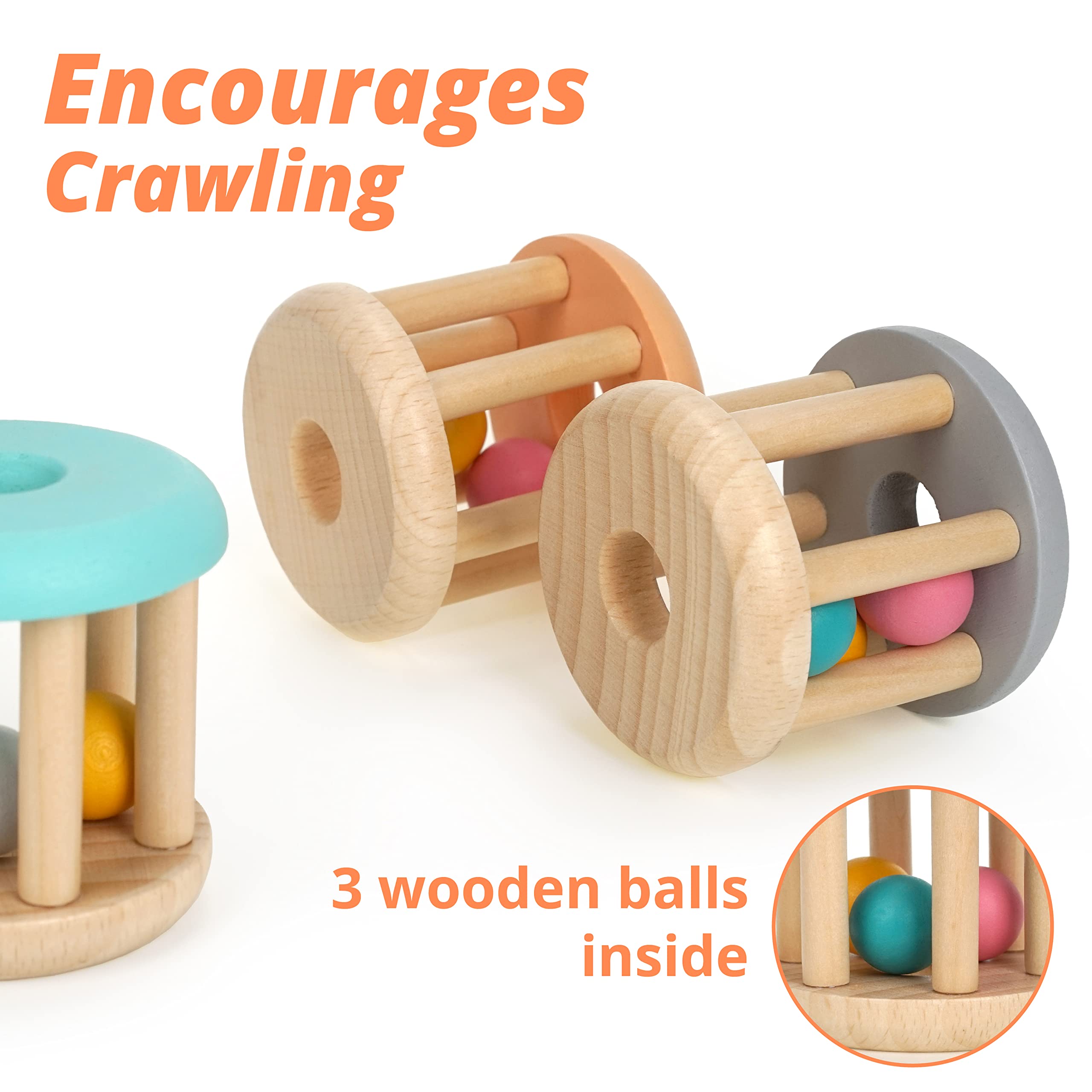 Infant grasps DUCKBOXX XX rolling rattle to boost early motor skills