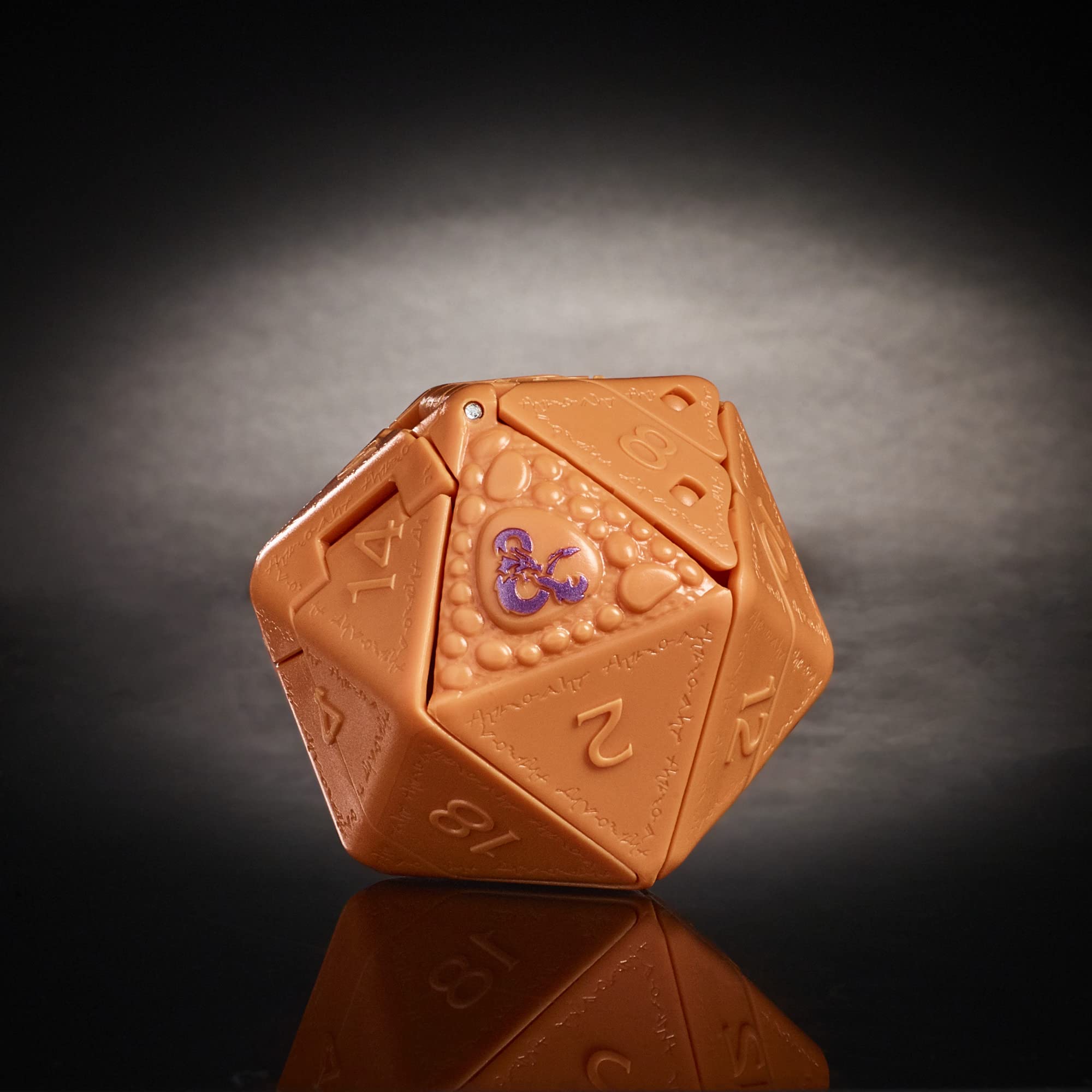 Beholder Dicelings display stand shown for desk or shelf placement.