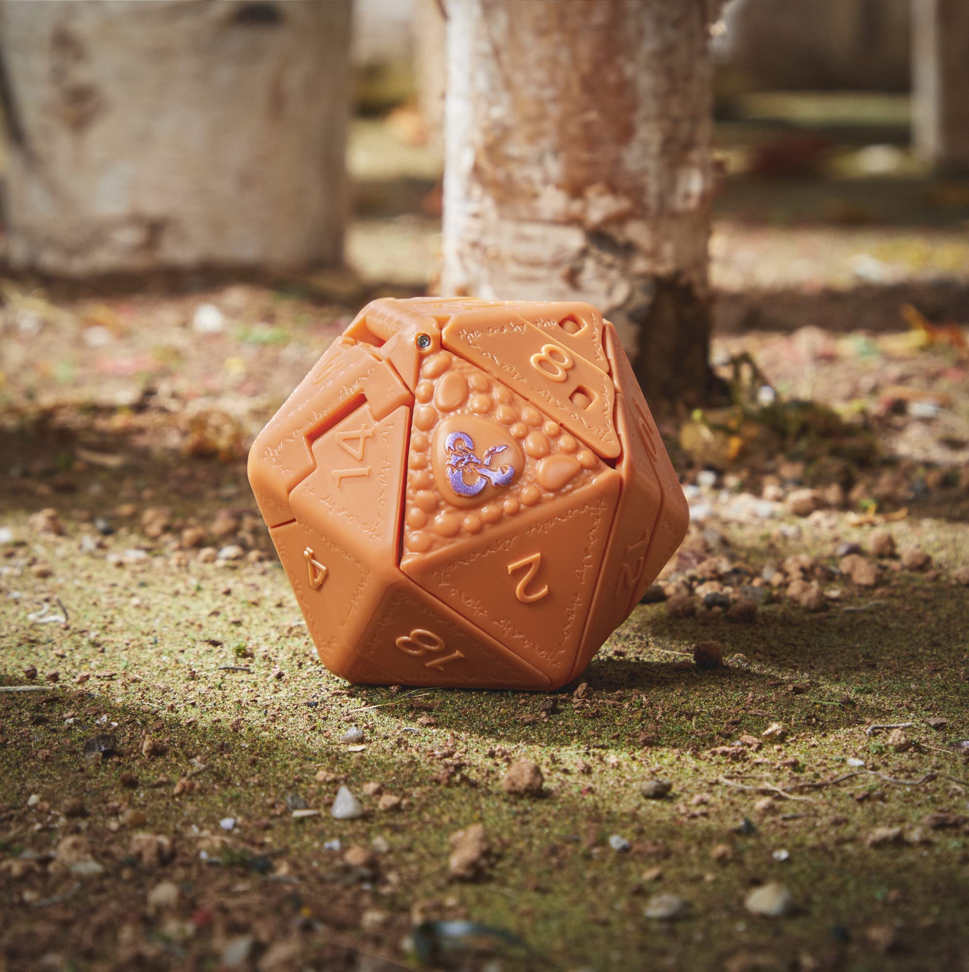 Sculpted textures on Beholder Dicelings highlight glossy finish and detail.