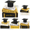 Dunzoom Class of 2026 cap and books ensemble decor brightens tabletops for a festive graduation setup
