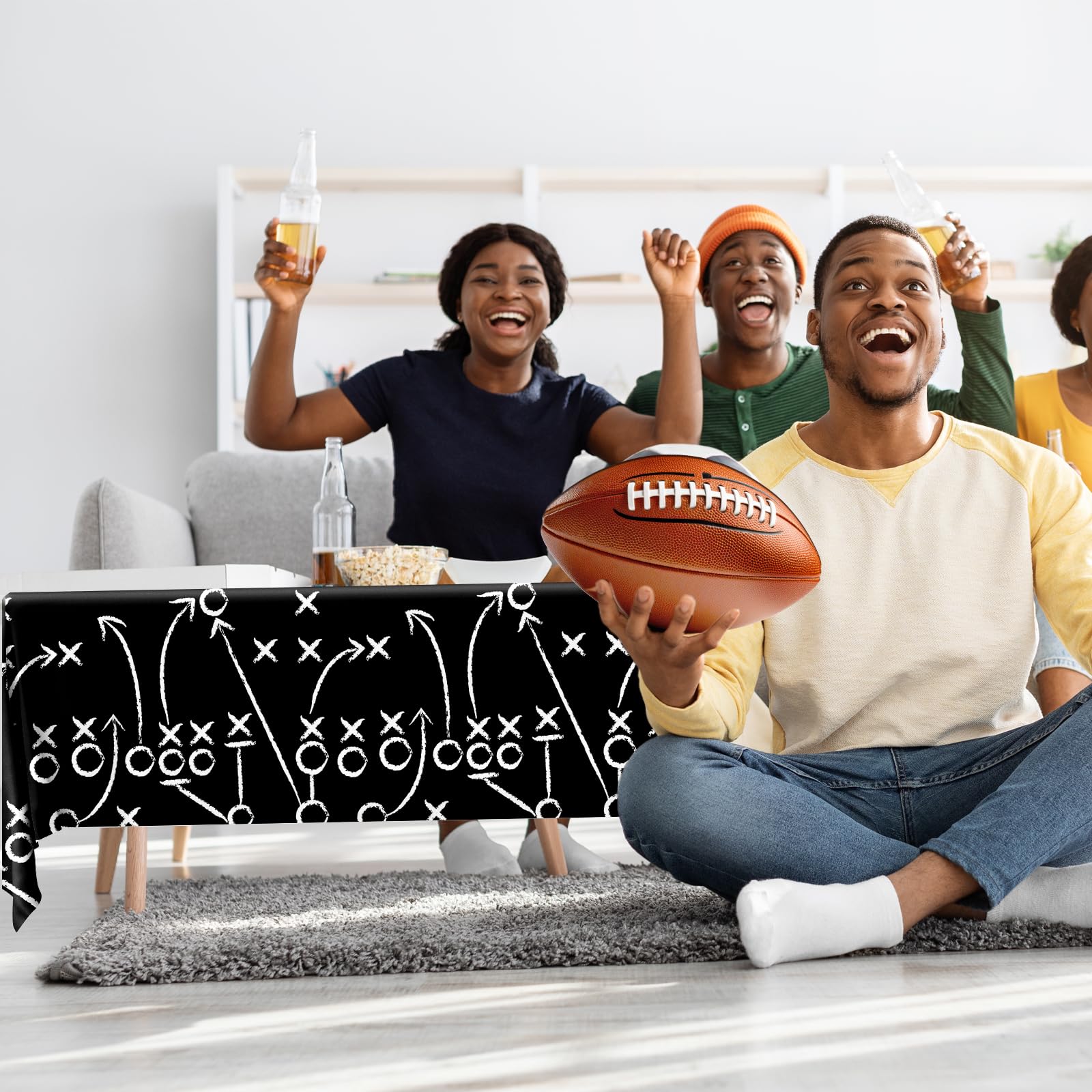 Dydamud football tablecloth tailgate setup creates ready-to-use serving area.