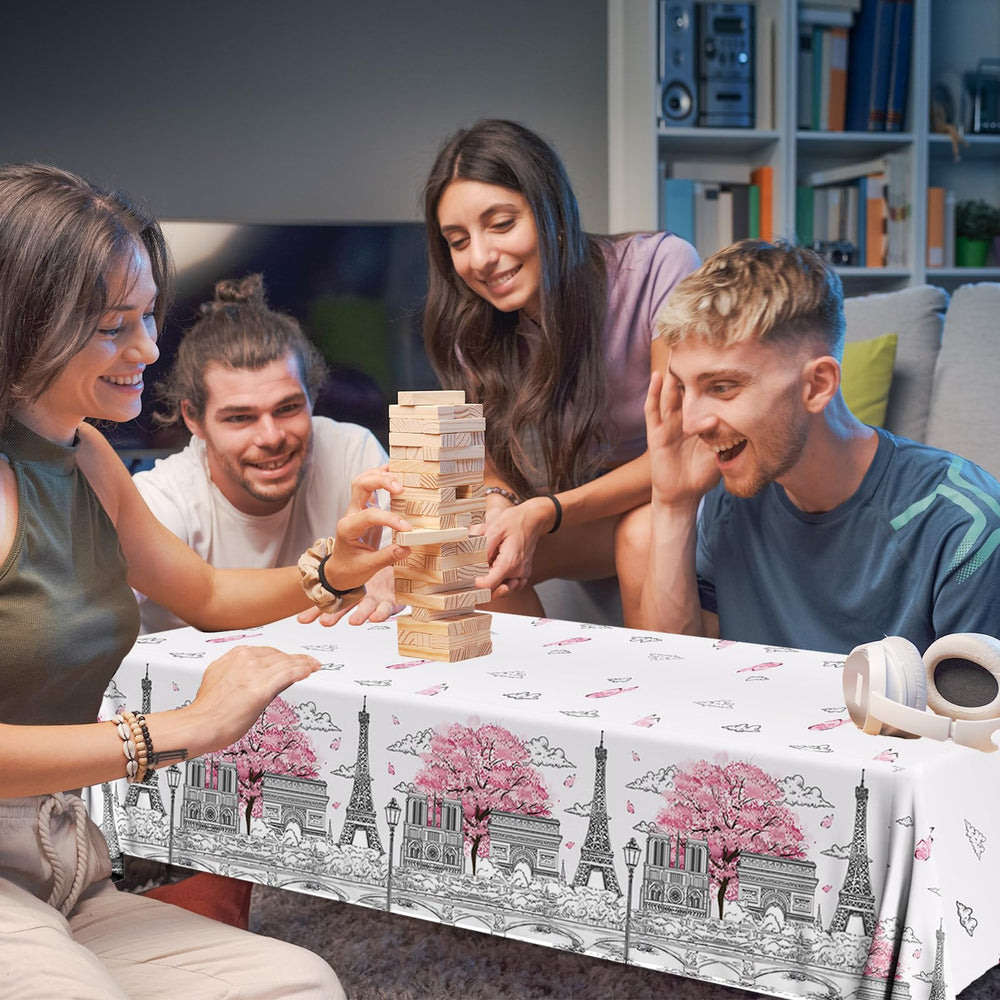 Dydamud Paris-theme tablecloth on table, ideal for indoor celebrations.