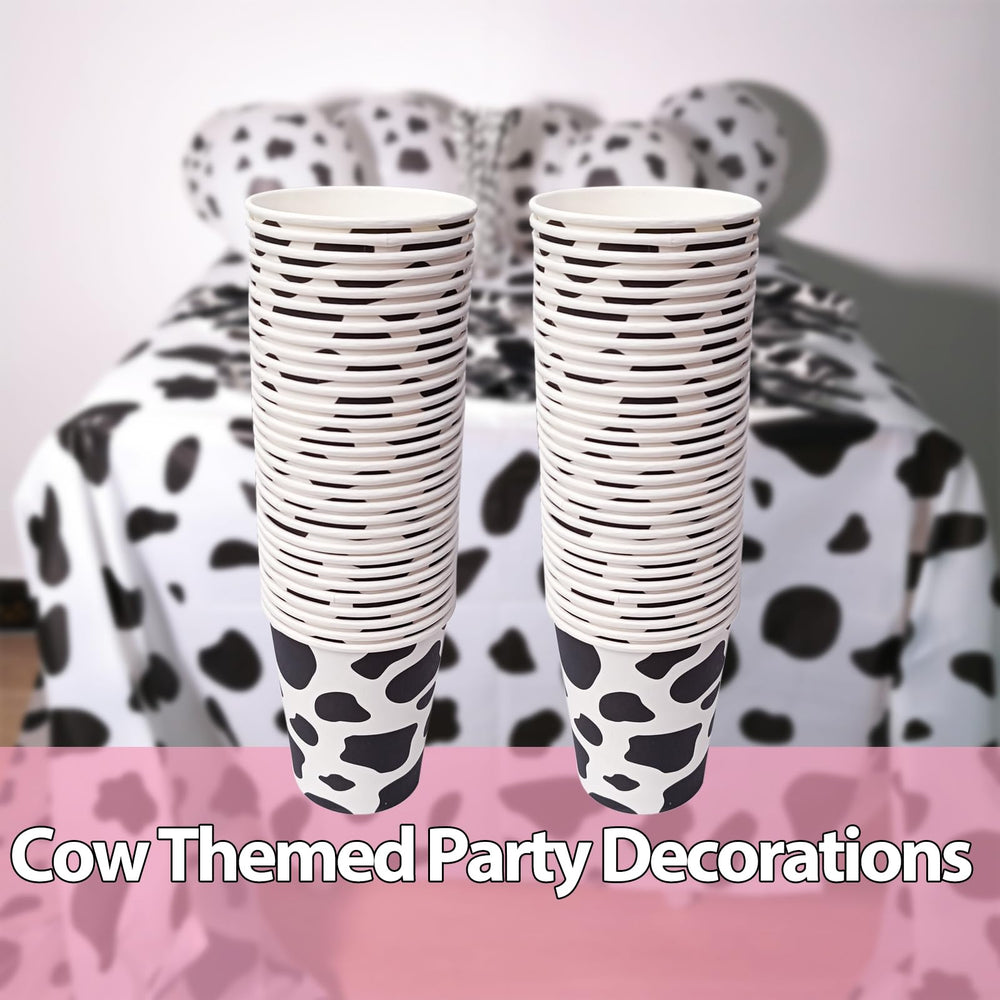 Stacked cow print cups ready for quick event setup.