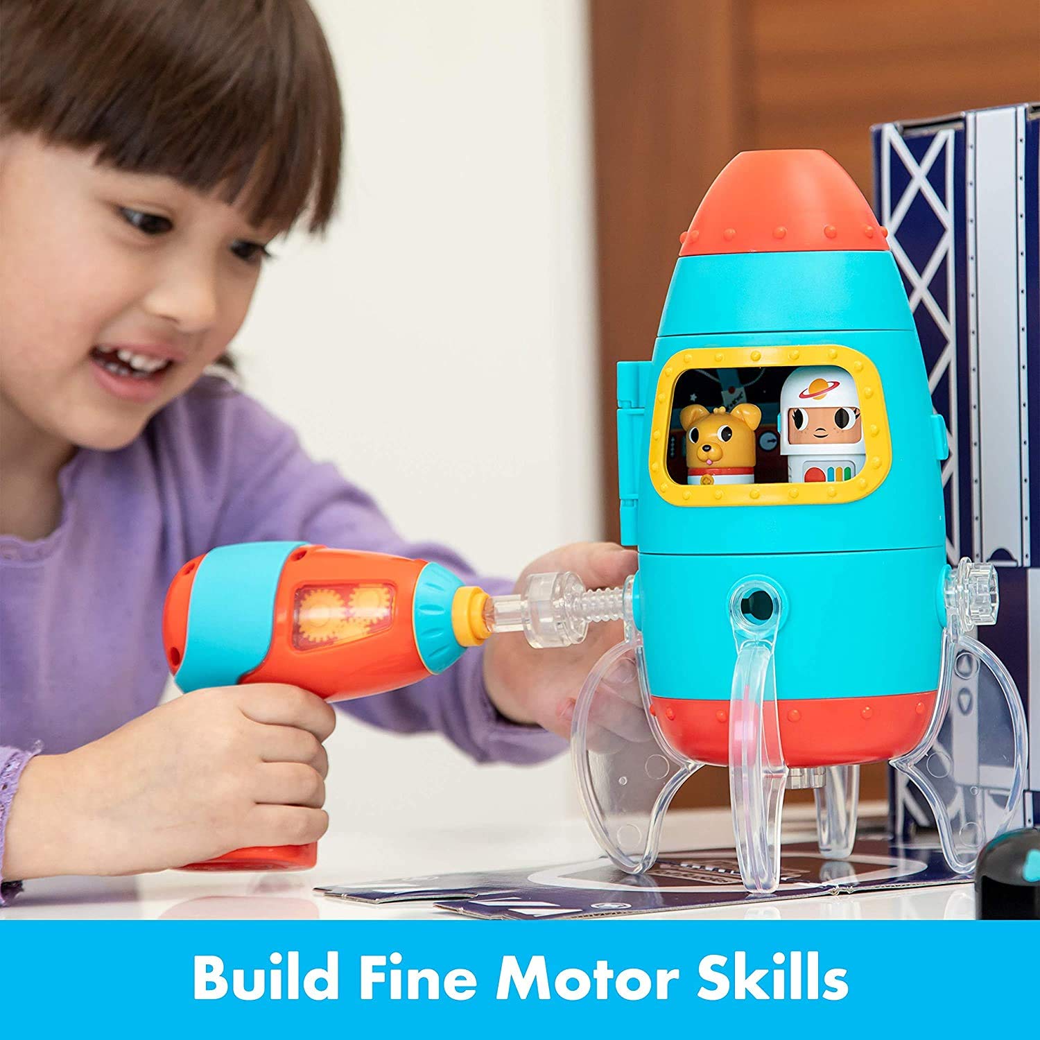 Educational Insights Design & Drill Bolt Buddies electric drill in action during pretend construction.